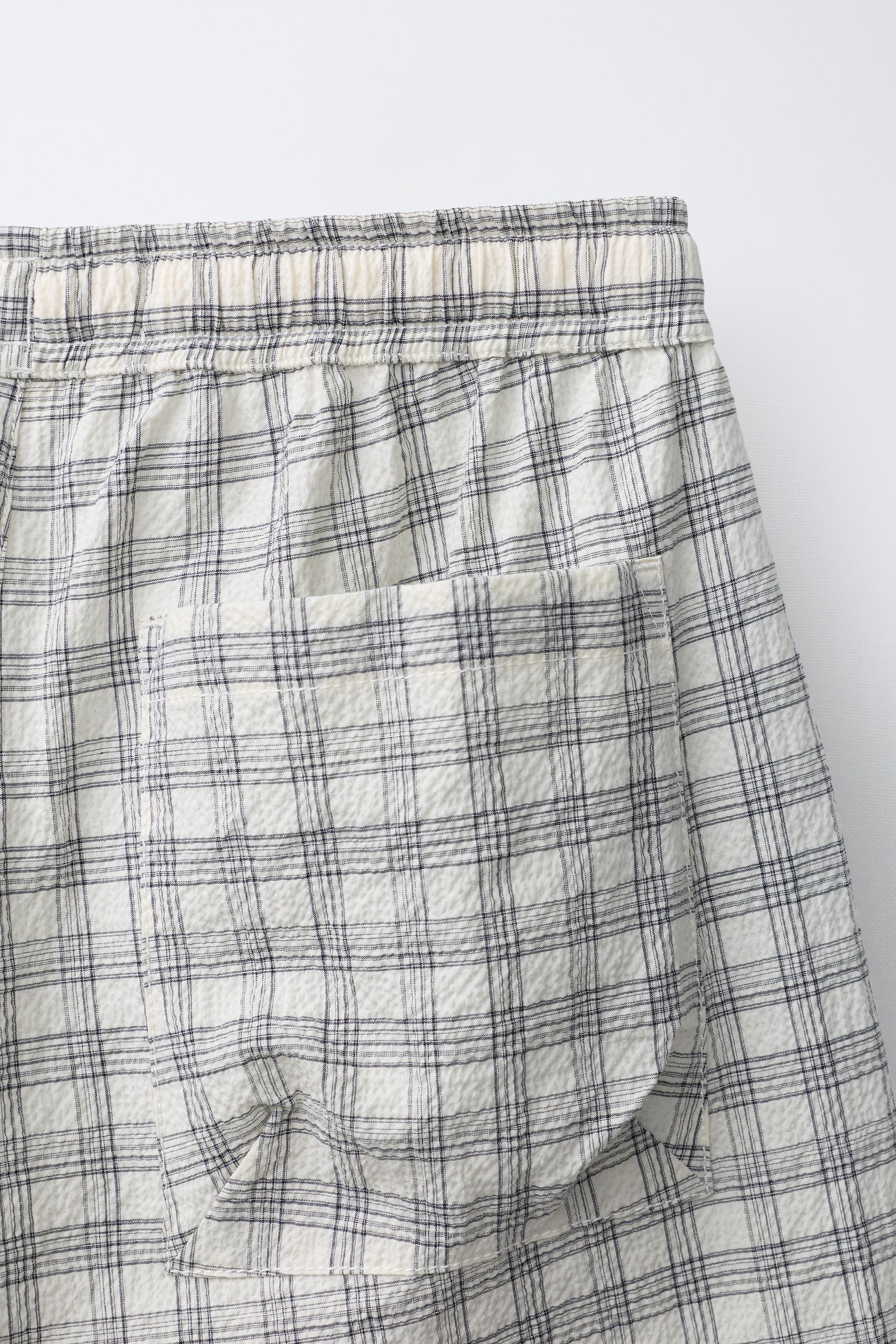 PUKAS SURF PLAID PRINT SHORTS